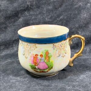 Royal Japan Vintage Porcelain Teacup with Gold Handle.